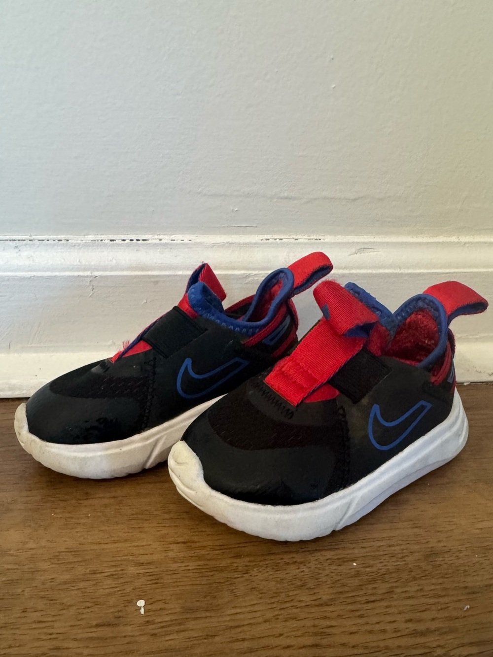 Nike Kids Black Sneakers with Red Accents